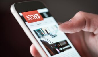 News article on screen