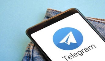 Telegram logo on phone screen