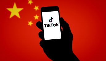 TikTok in front of Chinese flag