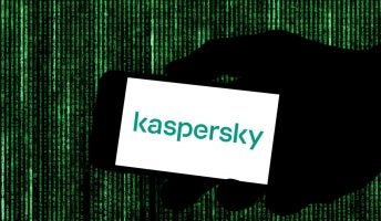 Logo of Kaspersky on a phone against green backdrop