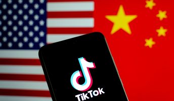 TikTok logo against US and China flag