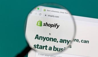 Shopify logo under a microscope