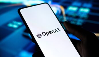OpenAI logo on phone screen