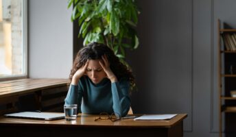 Young worker experiencing burnout