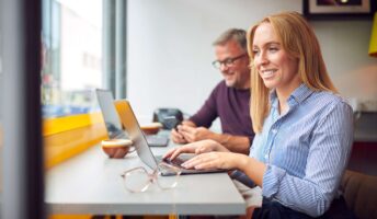 Two people working together