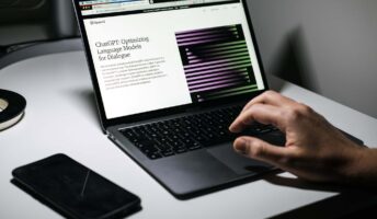 Worker reading about ChatGPT