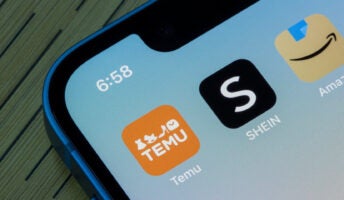 Temu, SHEIN, and Amazon app icons are seen on an iPhone.