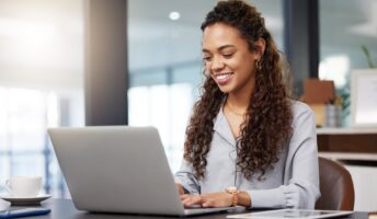 Women using a laptop at her desk