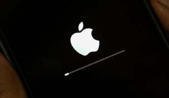 New version of iOS downloading on iPhone with Apple logo