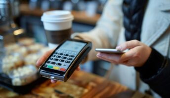 Vendor using a mobile POS app to take a payment