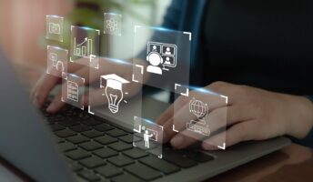 person using keyboard with graphic icons