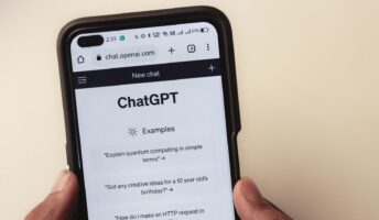 Phone showing someone using ChatGPT