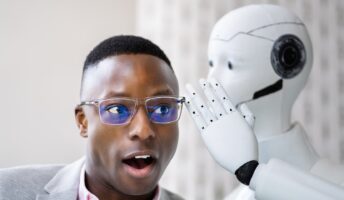 robot whispering to man