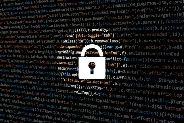 a secure padlock symbol of a background of computer code