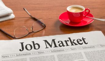 Job Market headline in Newspaper