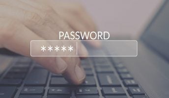 someone typing in password