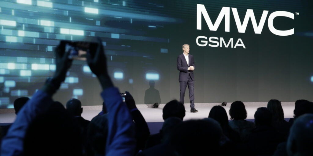 GSMA official speaks on stage during MWC keynote, one of the biggest tech conference events