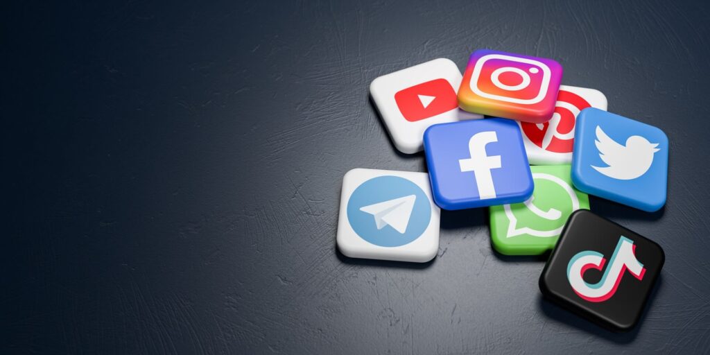2023 trends for social media represented by logos including tiktok, facebook, twitter and instagram