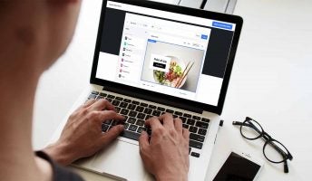 square online store man on laptop